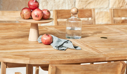 Teak outdoor furniture and resort style living at home