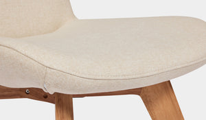 beige indoor dining chair