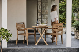 teak arm chairs with small folding table
