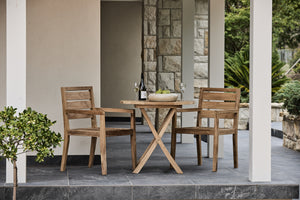 teak arm chairs with small folding table
