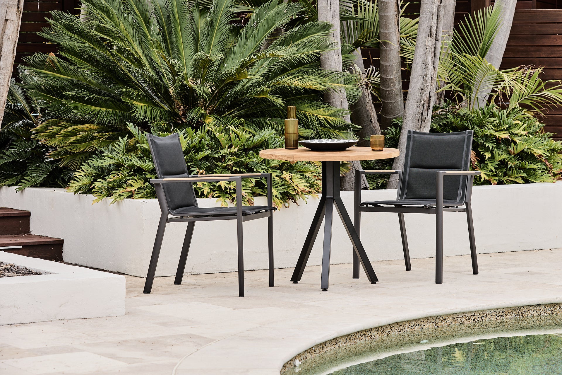 Black_Rockdale_Bistro_Setting_Teak_top_and_aluminium_legs_and_arm_chairs_1_a08de925-2eff-4569-a489-db8a03510dd8