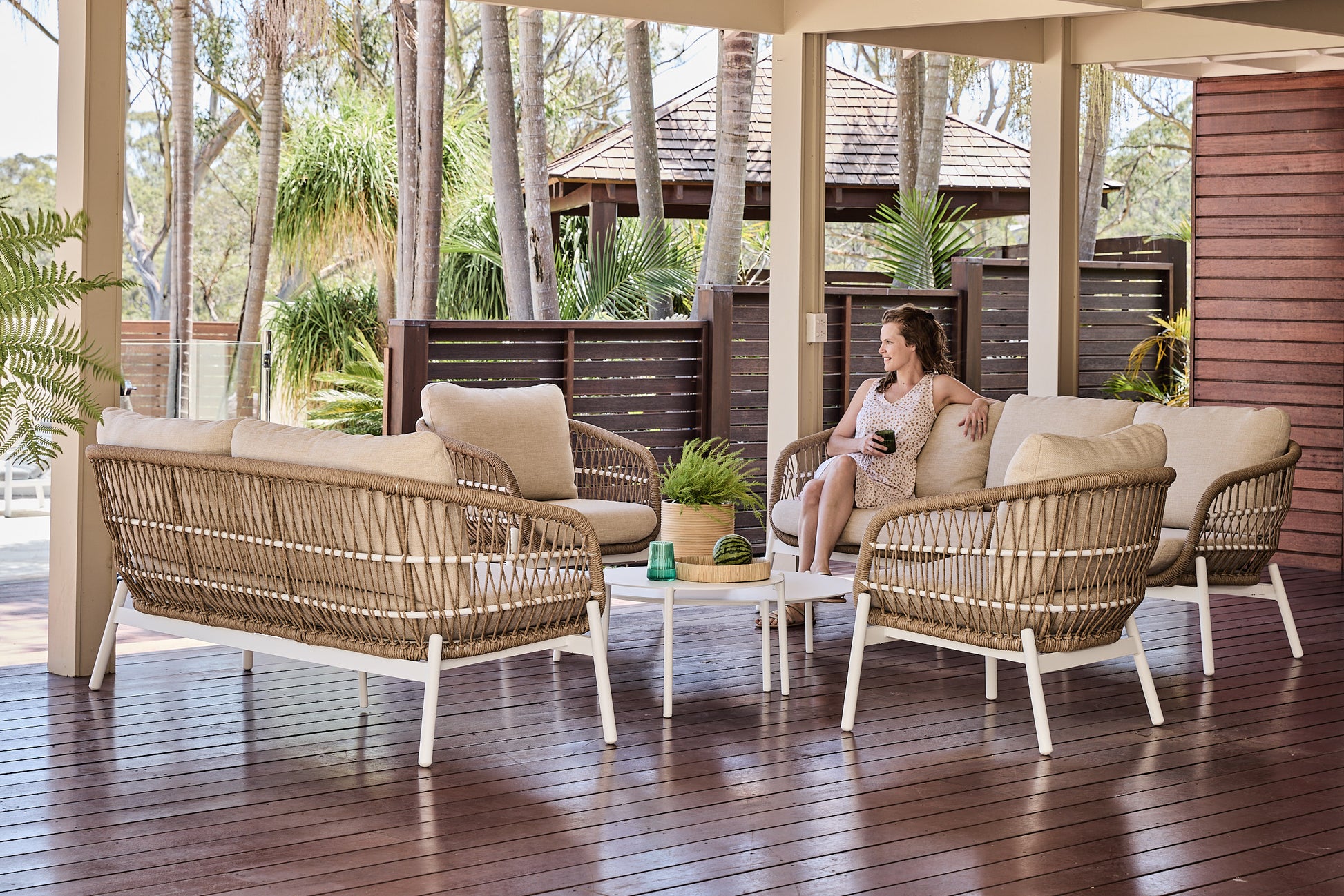 Ibiza Rope Outdoor Sofa setting in charcoalwithstone top dining table and twisted rattan chairs nat