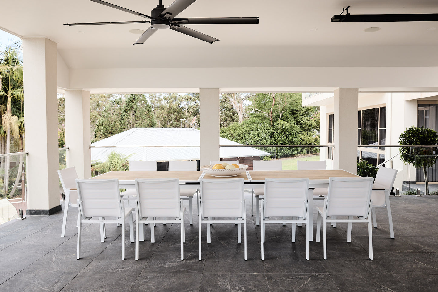 kai 280-340 teak dining table in white with noosa dining chairs