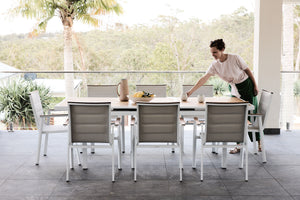 kai 180-240 teak dining table in white with kai dining chairs 2