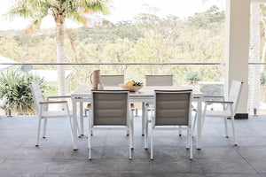 kai 180-240 teak dining table in white with kai dining chairs 3