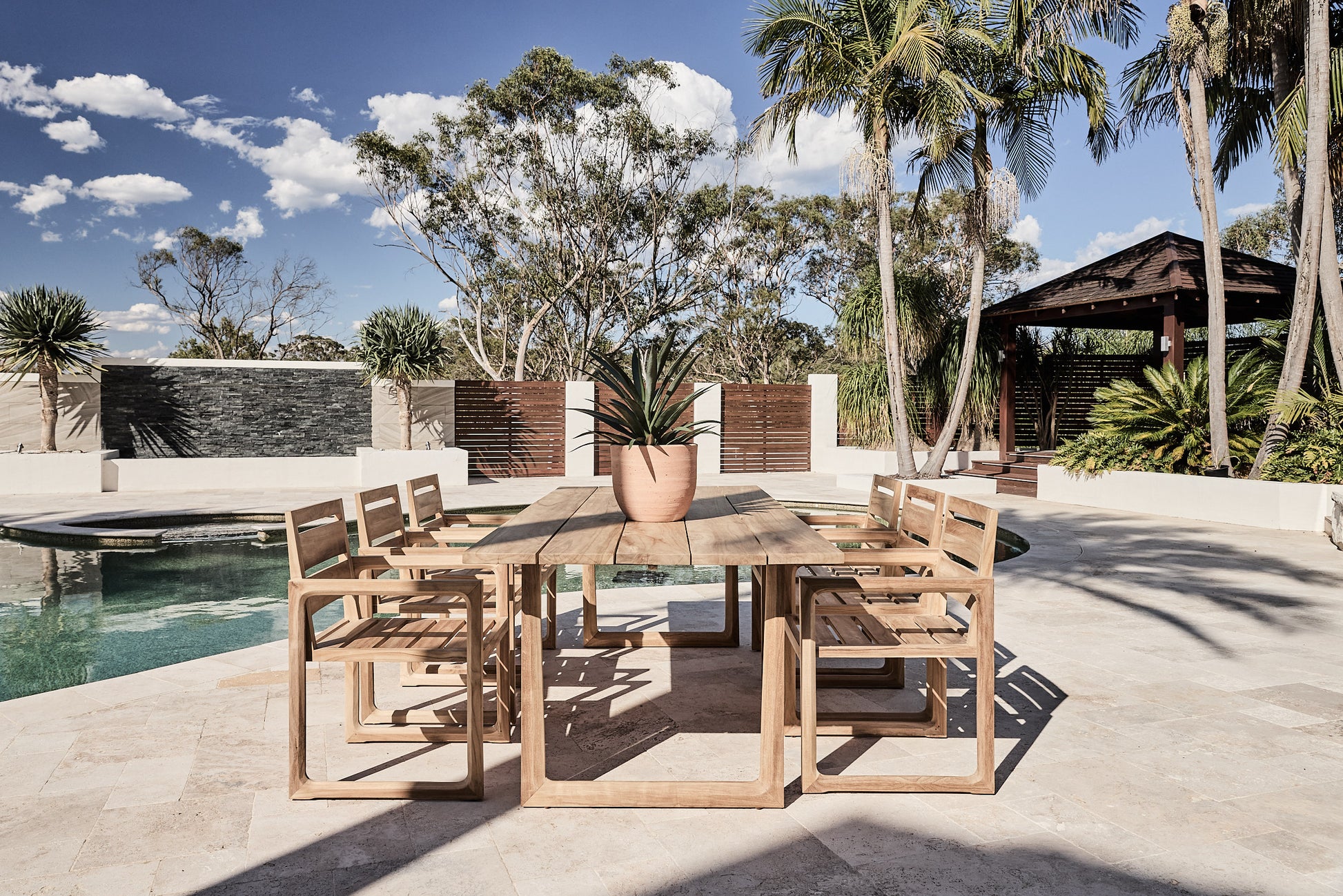 teak square arm chair setting outdoor