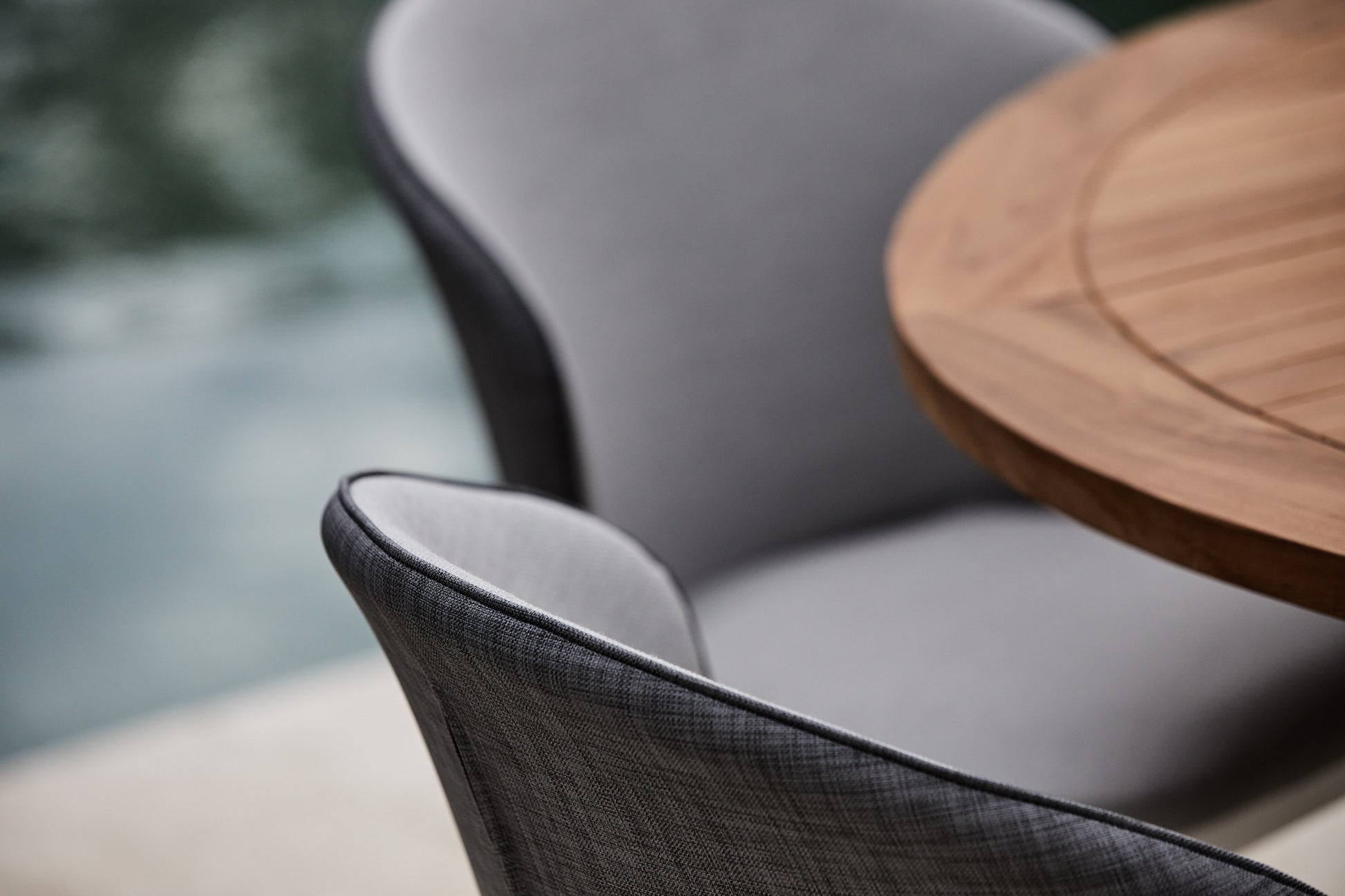 palma QDF outdoor fabric dining chairs and teak round table