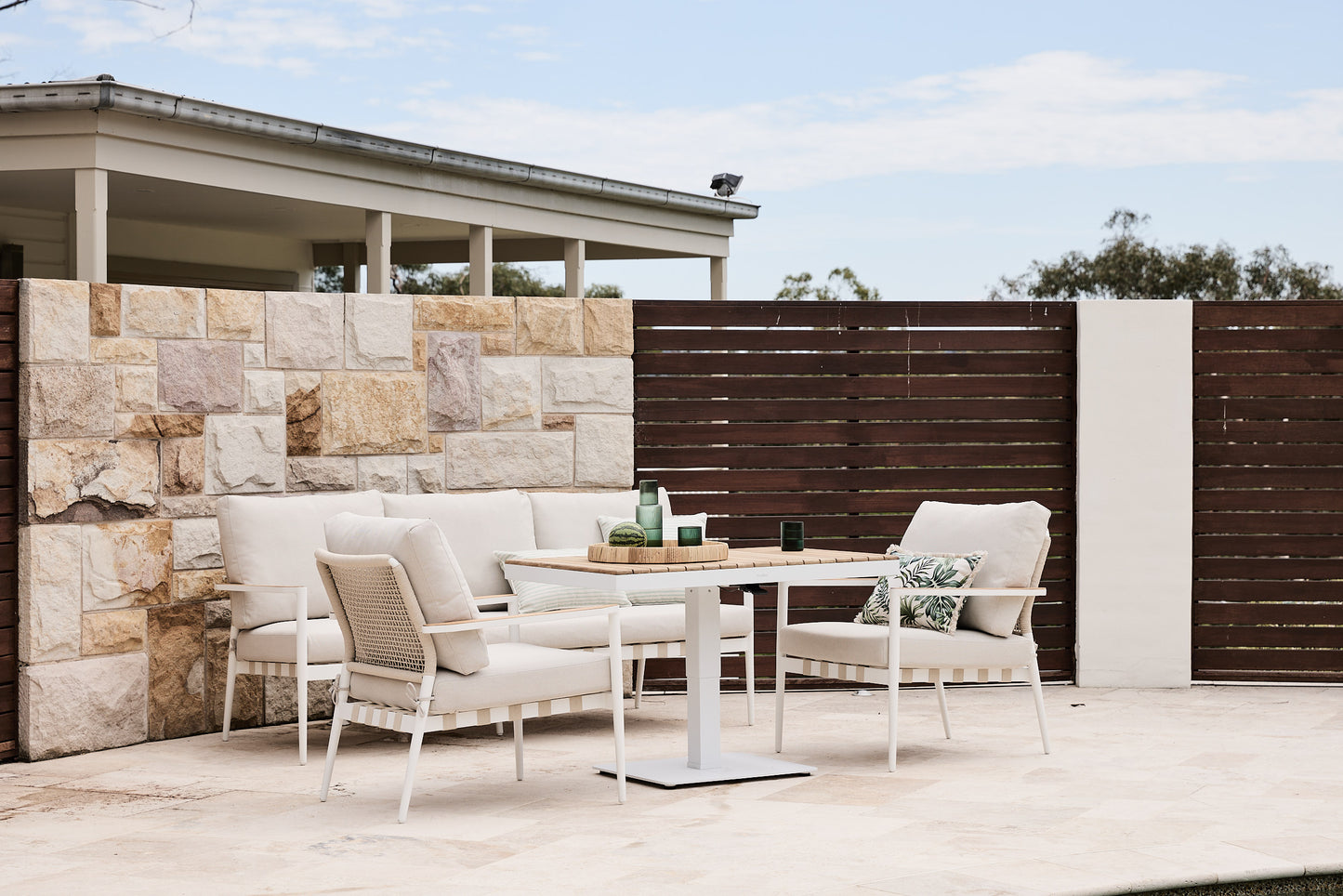 santiago outdoor sofa setting with white mackay adjustable coffee table and teak table top