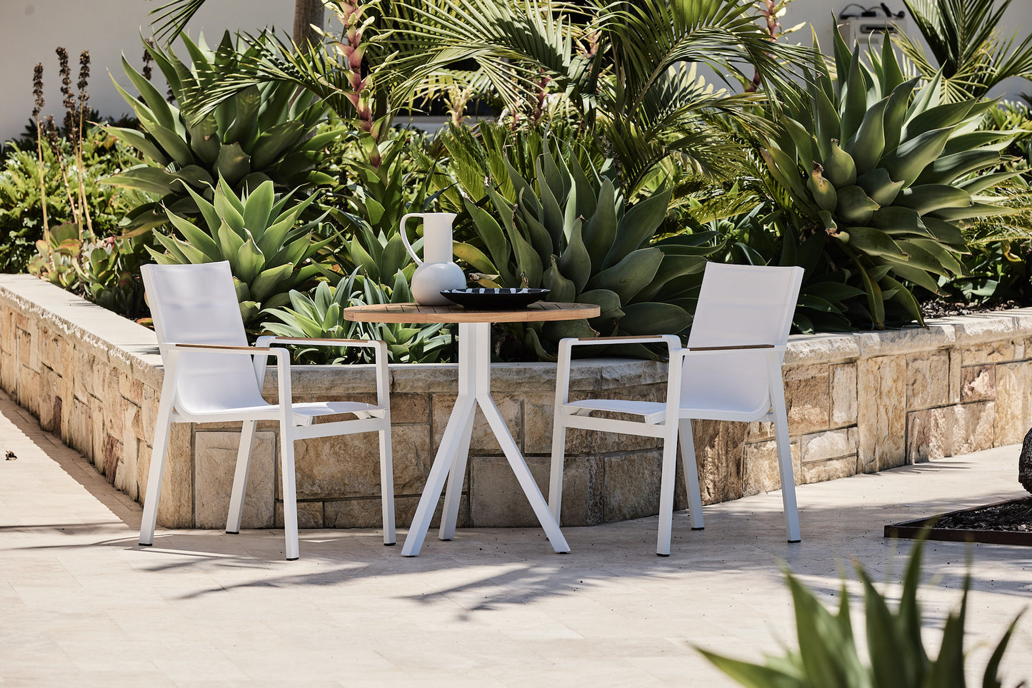 bisto 80cm table in teak with white arm chairs