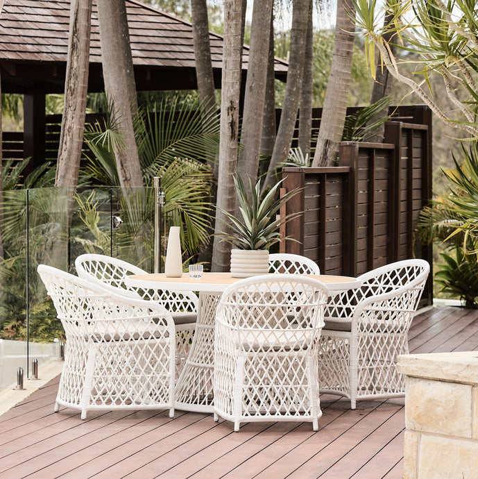 havana white synthetic wicker and round outdoor teak table setting