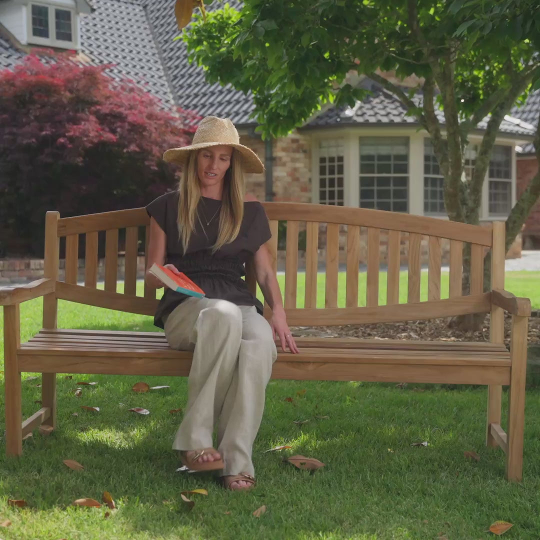 lifestyle video lion teak outdoor bench