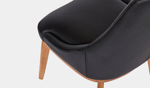 Narrabeen black leather chair with clear leg 4