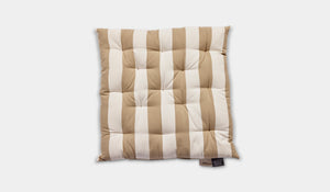 beige and white chair pad